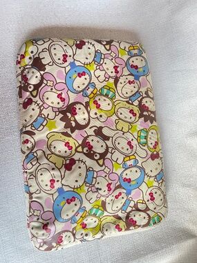 Hello Kitty Multicolor Character Zip Laptop Pouch in Cream, Pink, Blue